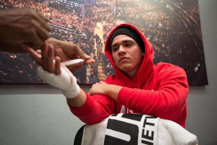 LAS VEGAS, NV - MARCH 27: Marco Olano gets his hands wrapped before facing Erick Montano during the filming of The Ultimate Fighter Latin America: Team Gastelum vs Team Escudero on March 27, 2015 in Las Vegas, Nevada. (Photo by Brandon Magnus/Zuffa LLC/
