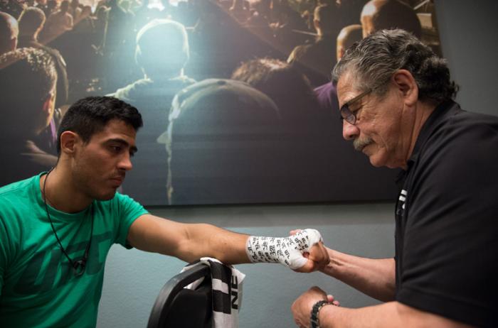 LAS VEGAS, NV - MARCH 27: Erick Montano gets his hands wrapped before facing Marco Olano during the filming of The Ultimate Fighter Latin America: Team Gastelum vs Team Escudero on March 27, 2015 in Las Vegas, Nevada. (Photo by Brandon Magnus/Zuffa LLC/