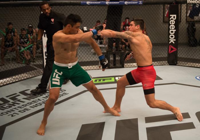 LAS VEGAS, NV - MARCH 27: (R-L) Marco Olano punches Erick Montano during the filming of The Ultimate Fighter Latin America: Team Gastelum vs Team Escudero on March 27, 2015 in Las Vegas, Nevada. (Photo by Brandon Magnus/Zuffa LLC/Zuffa LLC via Getty Ima