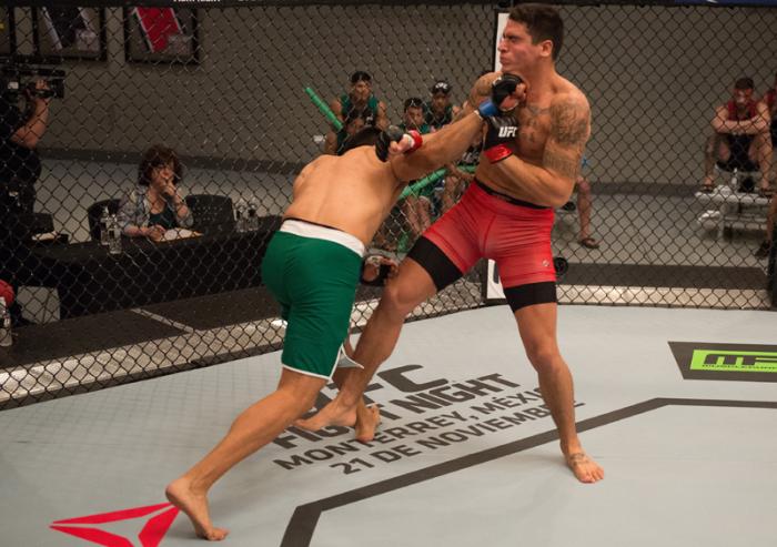 LAS VEGAS, NV - MARCH 27: (L-R) Erick Montano punches Marco Olano during the filming of The Ultimate Fighter Latin America: Team Gastelum vs Team Escudero on March 27, 2015 in Las Vegas, Nevada. (Photo by Brandon Magnus/Zuffa LLC/Zuffa LLC via Getty Ima