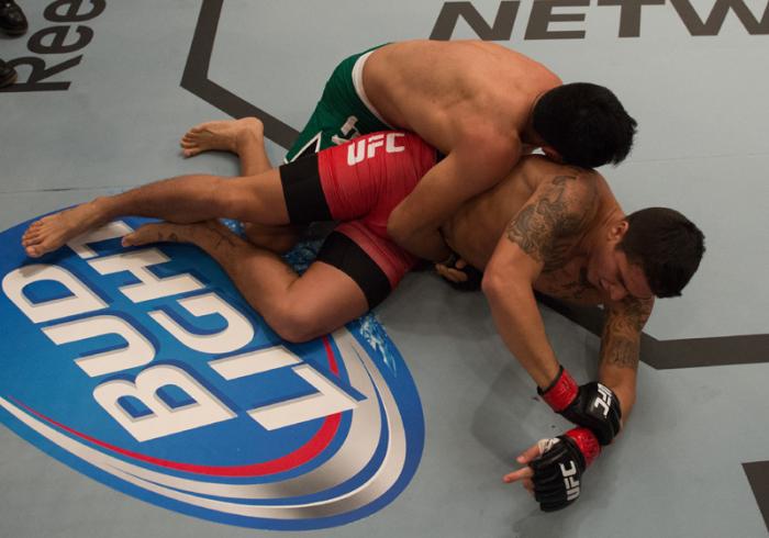 LAS VEGAS, NV - MARCH 27: Erick Montano (top) takes down Marco Olano during the filming of The Ultimate Fighter Latin America: Team Gastelum vs Team Escudero on March 27, 2015 in Las Vegas, Nevada. (Photo by Brandon Magnus/Zuffa LLC/Zuffa LLC via Getty I