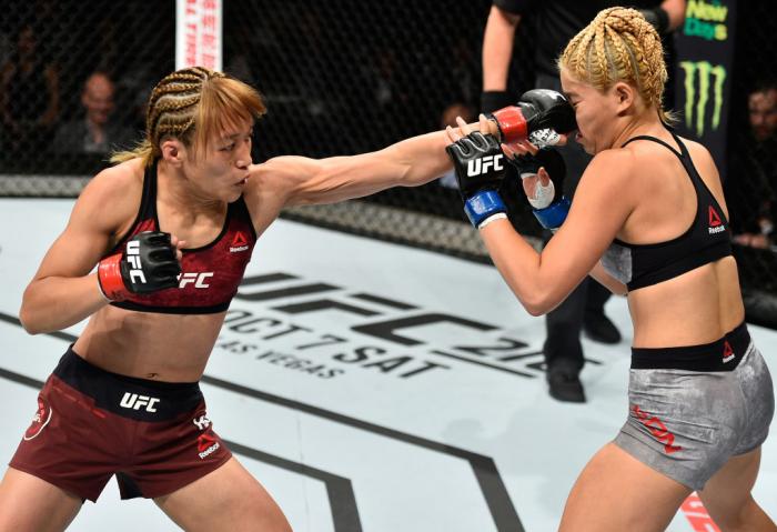 SAITAMA, JAPAN - SEPTEMBER 22: (L-R) Syuri Kondo punches Chanmi Jeon of South Korea in their women's strawweight bout during the UFC Fight Night event inside the Saitama Super Arena on September 22, 2017 in Saitama, Japan. (Photo by Jeff Bottari/Zuffa LL