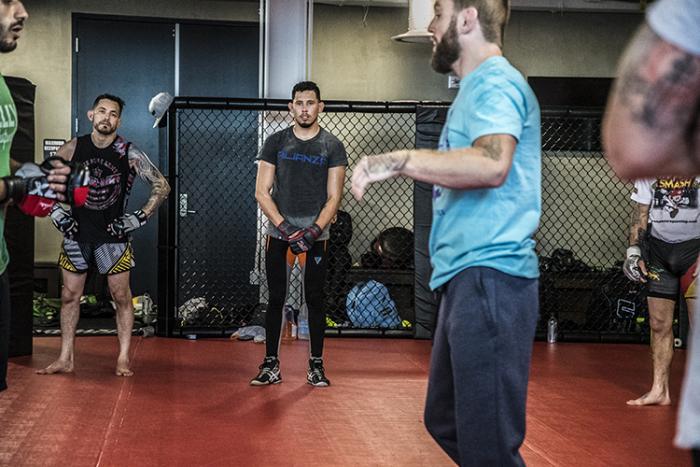 Las Vegas 5/3/18 - UFC fighters Henry Briones and Martin Bravo listen to Tim Elliot at the UFC Performance Institute in las Vegas. (Photo credit: Juan Cardenas)