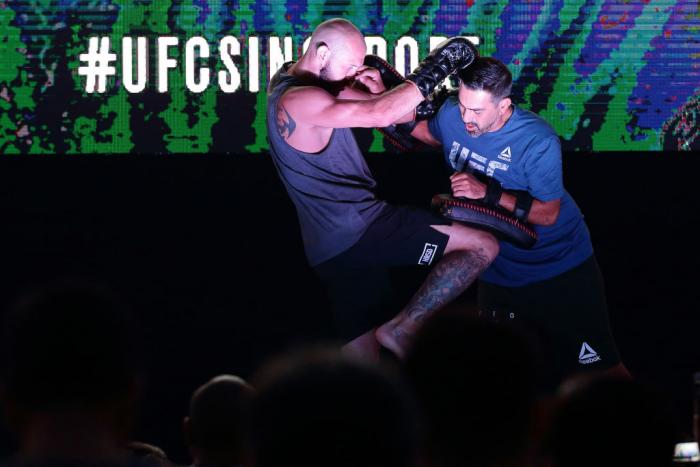 SINGAPORE - JUNE 20:  Donald Cerrone (L) of the United States participates in the UFC Fight Night Open Workout at OCBC Square on June 20, 2018 in Singapore.  (Photo by Suhaimi Abdullah - Zuffa LLC/Zuffa LLC)