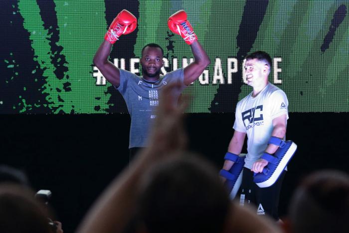 SINGAPORE - JUNE 20:  Leon Edwards (L) of Jamaica participates in the UFC Fight Night Open Workout at OCBC Square on June 20, 2018 in Singapore.  (Photo by Suhaimi Abdullah - Zuffa LLC/Zuffa LLC)