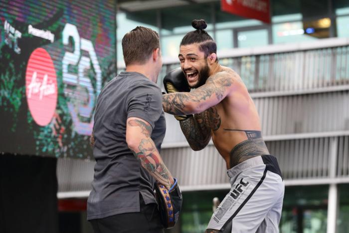 SINGAPORE - JUNE 20:  Tyson Pedro (R) of Australia participates in the UFC Fight Night Open Workout at OCBC Square on June 20, 2018 in Singapore.  (Photo by Suhaimi Abdullah - Zuffa LLC/Zuffa LLC)