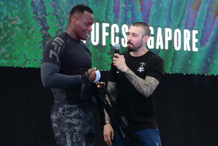 SINGAPORE - JUNE 20:  Ovince Saint Preux (L) of United States speaks to fans during the UFC Fight Night Open Workout at OCBC Square on June 20, 2018 in Singapore.  (Photo by Suhaimi Abdullah - Zuffa LLC/Zuffa LLC)