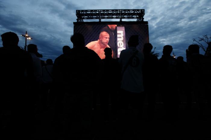 SINGAPORE - JUNE 20:  Fans watch a video footage of Donald Cerrone of United States during the UFC Fight Night Open Workout at OCBC Square on June 20, 2018 in Singapore.  (Photo by Suhaimi Abdullah - Zuffa LLC/Zuffa LLC)