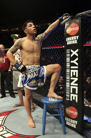 CALGARY, CANADA - JULY 21: Daniel Pineda looks to the crowd after being knocked out by Antonio Carvalho during their featherweight bout at UFC 149 inside the Scotiabank Saddledome on July 21, 2012 in Calgary, Alberta, Canada. (Photo by Nick Laham/Zuffa L