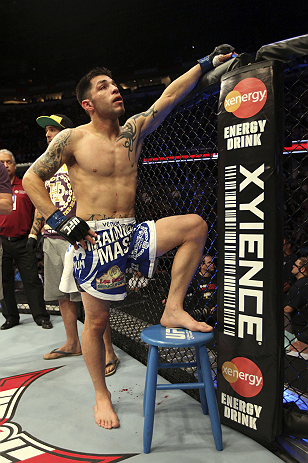 CALGARY, CANADA - JULY 21: Daniel Pineda looks to the crowd after being knocked out by Antonio Carvalho during their featherweight bout at UFC 149 inside the Scotiabank Saddledome on July 21, 2012 in Calgary, Alberta, Canada.  (Photo by Nick Laham/Zuffa L