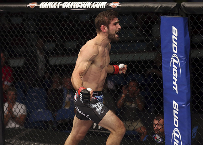 CALGARY, CANADA - JULY 21: Antonio Carvalho celebrates after knocking out Daniel Pineda during their featherweight bout at UFC 149 inside the Scotiabank Saddledome on July 21, 2012 in Calgary, Alberta, Canada. (Photo by Nick Laham/Zuffa LLC/Zuffa LLC vi