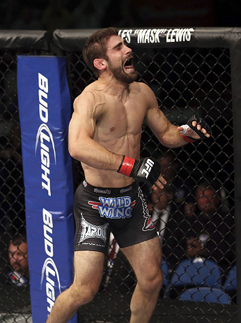 CALGARY, CANADA - JULY 21: Antonio Carvalho celebrates after knocking out Daniel Pineda during their featherweight bout at UFC 149 inside the Scotiabank Saddledome on July 21, 2012 in Calgary, Alberta, Canada. (Photo by Nick Laham/Zuffa LLC/Zuffa LLC vi