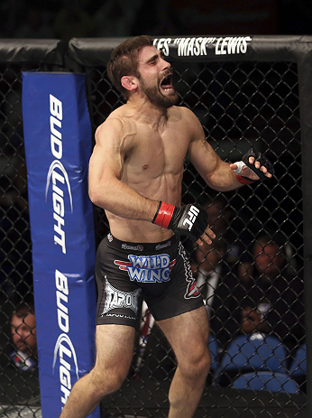 CALGARY, CANADA - JULY 21:  Antonio Carvalho celebrates after knocking out Daniel Pineda during their featherweight bout at UFC 149 inside the Scotiabank Saddledome on July 21, 2012 in Calgary, Alberta, Canada.  (Photo by Nick Laham/Zuffa LLC/Zuffa LLC vi