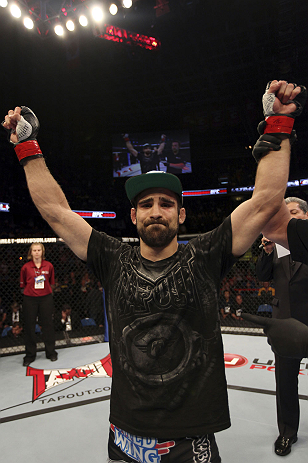 CALGARY, CANADA - JULY 21:  Antonio Carvalho celebrates after defeating Daniel Pineda by knockout during their featherweight bout at UFC 149 inside the Scotiabank Saddledome on July 21, 2012 in Calgary, Alberta, Canada.  (Photo by Nick Laham/Zuffa LLC/Zuf