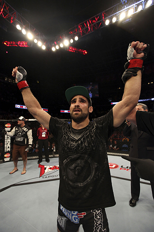 CALGARY, CANADA - JULY 21:  Antonio Carvalho celebrates after defeating Daniel Pineda by knockout during their featherweight bout at UFC 149 inside the Scotiabank Saddledome on July 21, 2012 in Calgary, Alberta, Canada.  (Photo by Nick Laham/Zuffa LLC/Zuf