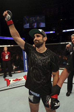 CALGARY, CANADA - JULY 21:  Antonio Carvalho celebrates after defeating Daniel Pineda by knockout during their featherweight bout at UFC 149 inside the Scotiabank Saddledome on July 21, 2012 in Calgary, Alberta, Canada.  (Photo by Nick Laham/Zuffa LLC/Zuf