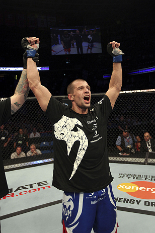 CALGARY, CANADA - JULY 21: Anton Kuivanen celebrates after defeating Mitch Clarke after their lightweight bout at UFC 149 inside the Scotiabank Saddledome on July 21, 2012 in Calgary, Alberta, Canada. (Photo by Nick Laham/Zuffa LLC/Zuffa LLC via Getty I
