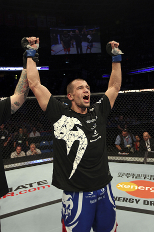 CALGARY, CANADA - JULY 21:  Anton Kuivanen celebrates after defeating Mitch Clarke after their lightweight bout at UFC 149 inside the Scotiabank Saddledome on July 21, 2012 in Calgary, Alberta, Canada.  (Photo by Nick Laham/Zuffa LLC/Zuffa LLC via Getty I