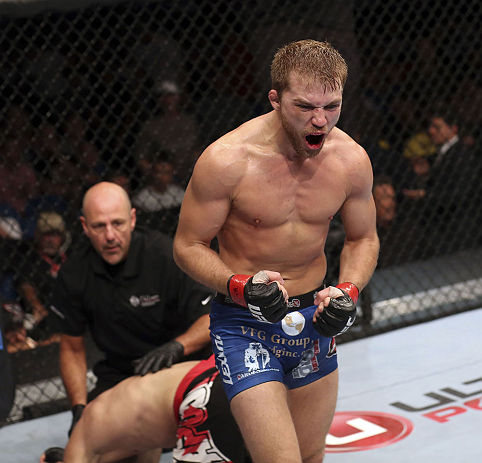 CALGARY, CANADA - JULY 21: Bryan Caraway celebrates after forcing Mitch Gagnon to tap out during their bantamweight bout at UFC 149 inside the Scotiabank Saddledome on July 21, 2012 in Calgary, Alberta, Canada. (Photo by Nick Laham/Zuffa LLC/Zuffa LLC vi