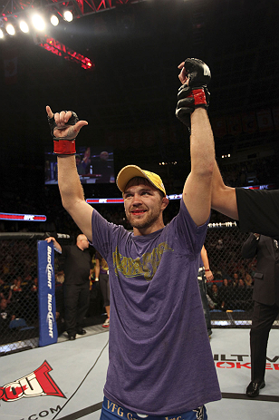 CALGARY, CANADA - JULY 21:  Bryan Caraway celebrates after defeating Mitch Gagnon during their bantamweight bout at UFC 149 inside the Scotiabank Saddledome on July 21, 2012 in Calgary, Alberta, Canada.  (Photo by Nick Laham/Zuffa LLC/Zuffa LLC via Getty 