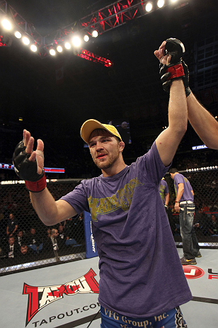 CALGARY, CANADA - JULY 21: Bryan Caraway celebrates after defeating Mitch Gagnon during their bantamweight bout at UFC 149 inside the Scotiabank Saddledome on July 21, 2012 in Calgary, Alberta, Canada. (Photo by Nick Laham/Zuffa LLC/Zuffa LLC via Getty