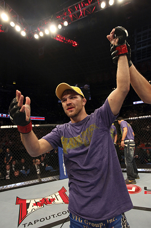 CALGARY, CANADA - JULY 21:  Bryan Caraway celebrates after defeating Mitch Gagnon during their bantamweight bout at UFC 149 inside the Scotiabank Saddledome on July 21, 2012 in Calgary, Alberta, Canada.  (Photo by Nick Laham/Zuffa LLC/Zuffa LLC via Getty 