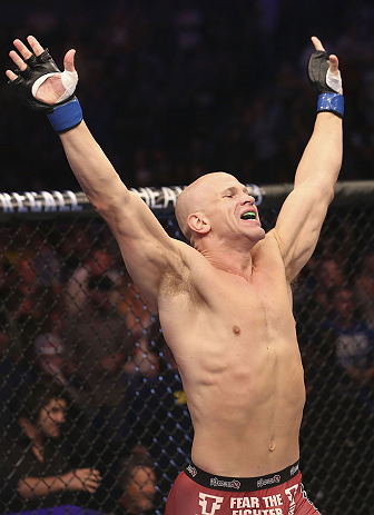 CALGARY, CANADA - JULY 21: Ryan Jimmo celebrates after defeating Anthony Perosh by knockout in six seconds during round one of their light heavyweight bout at UFC 149 inside the Scotiabank Saddledome on July 21, 2012 in Calgary, Alberta, Canada. (Photo