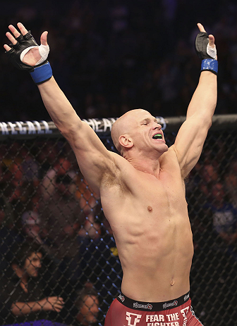 CALGARY, CANADA - JULY 21:  Ryan Jimmo celebrates after defeating Anthony Perosh by knockout in six seconds during round one of their light heavyweight bout at UFC 149 inside the Scotiabank Saddledome on July 21, 2012 in Calgary, Alberta, Canada.  (Photo 