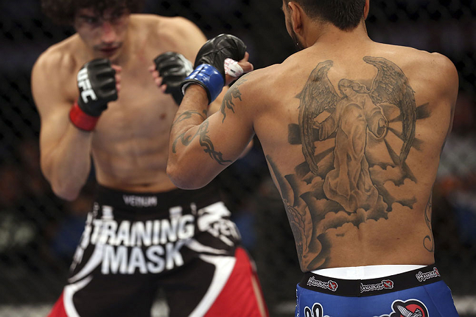 CALGARY, CANADA - JULY 21: (L-R) Roland Delorme looks to attack Francisco Rivera during their bantamweight bout at UFC 149 inside the Scotiabank Saddledome on July 21, 2012 in Calgary, Alberta, Canada.  (Photo by Nick Laham/Zuffa LLC/Zuffa LLC via Getty I