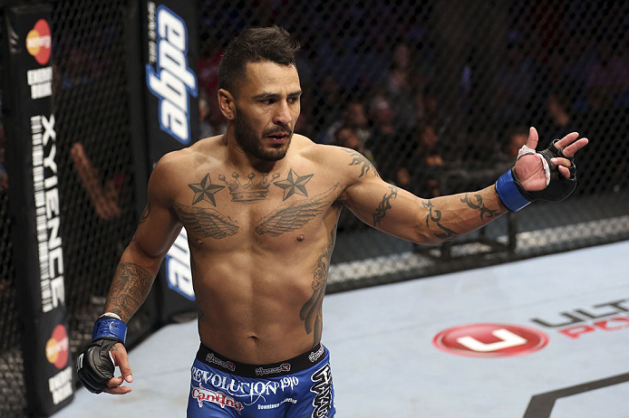 CALGARY, CANADA - JULY 21: Francisco Rivera celebrates after defeating Roland Delorme during their bantamweight bout at UFC 149 inside the Scotiabank Saddledome on July 21, 2012 in Calgary, Alberta, Canada.  (Photo by Nick Laham/Zuffa LLC/Zuffa LLC via Ge