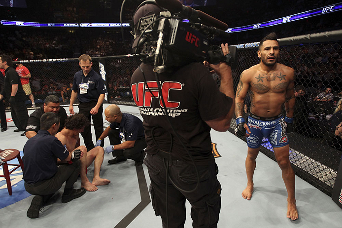 CALGARY, CANADA - JULY 21: (R-L) Francisco Rivera celebrates after defeating Roland Delorme during their bantamweight bout at UFC 149 inside the Scotiabank Saddledome on July 21, 2012 in Calgary, Alberta, Canada. (Photo by Nick Laham/Zuffa LLC/Zuffa LLC