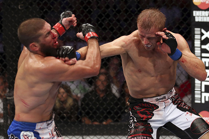 CALGARY, CANADA - JULY 21: (R-L) Nick Ring lands a punch to the head of Court McGee during their middleweight bout at UFC 149 inside the Scotiabank Saddledome on July 21, 2012 in Calgary, Alberta, Canada. (Photo by Nick Laham/Zuffa LLC/Zuffa LLC via Gett