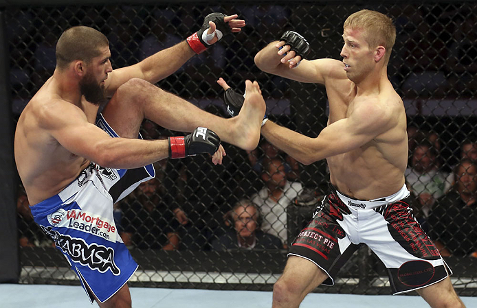 CALGARY, CANADA - JULY 21: (L-R) Court McGee exchanges contact with Nick Ring during their middleweight bout at UFC 149 inside the Scotiabank Saddledome on July 21, 2012 in Calgary, Alberta, Canada. (Photo by Nick Laham/Zuffa LLC/Zuffa LLC via Getty Imag