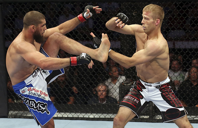 CALGARY, CANADA - JULY 21: (L-R) Court McGee exchanges contact with Nick Ring during their middleweight bout at UFC 149 inside the Scotiabank Saddledome on July 21, 2012 in Calgary, Alberta, Canada.  (Photo by Nick Laham/Zuffa LLC/Zuffa LLC via Getty Imag