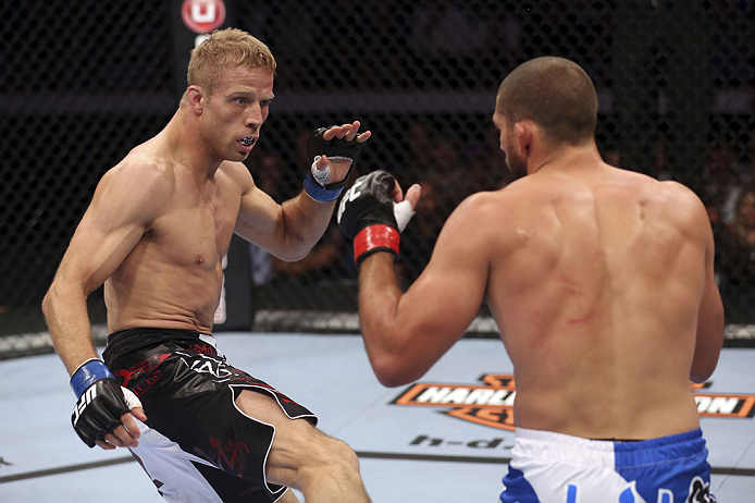 CALGARY, CANADA - JULY 21: (L-R) Nick Ring looks to strike against Court McGee during their middleweight bout at UFC 149 inside the Scotiabank Saddledome on July 21, 2012 in Calgary, Alberta, Canada. (Photo by Nick Laham/Zuffa LLC/Zuffa LLC via Getty Ima