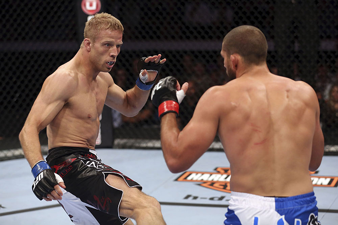 CALGARY, CANADA - JULY 21: (L-R) Nick Ring looks to strike against Court McGee during their middleweight bout at UFC 149 inside the Scotiabank Saddledome on July 21, 2012 in Calgary, Alberta, Canada.  (Photo by Nick Laham/Zuffa LLC/Zuffa LLC via Getty Ima