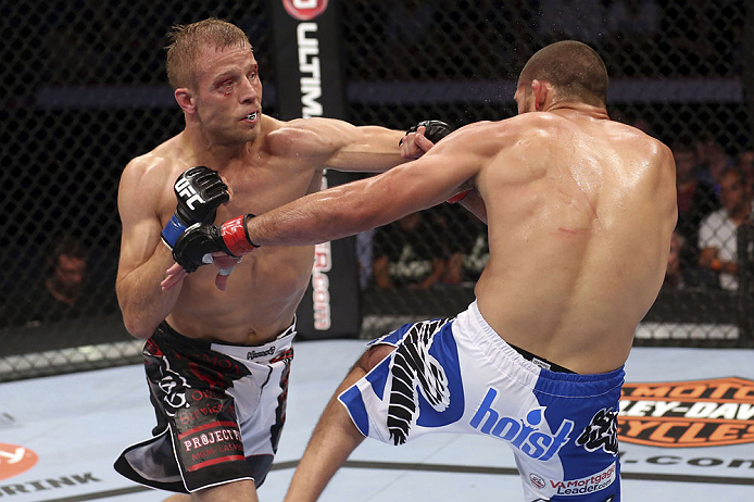 CALGARY, CANADA - JULY 21: (L-R) Nick Ring lands a punch to the head of Court McGee during their middleweight bout at UFC 149 inside the Scotiabank Saddledome on July 21, 2012 in Calgary, Alberta, Canada. (Photo by Nick Laham/Zuffa LLC/Zuffa LLC via Get