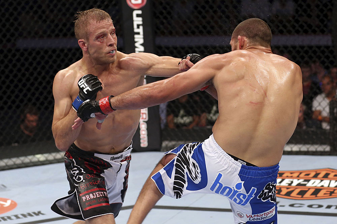 CALGARY, CANADA - JULY 21:  (L-R) Nick Ring lands a punch to the head of Court McGee during their middleweight bout at UFC 149 inside the Scotiabank Saddledome on July 21, 2012 in Calgary, Alberta, Canada.  (Photo by Nick Laham/Zuffa LLC/Zuffa LLC via Get