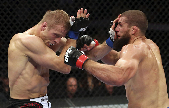 CALGARY, CANADA - JULY 21: (L-R) Nick Ring exchanges strikes with Court McGee during their middleweight bout at UFC 149 inside the Scotiabank Saddledome on July 21, 2012 in Calgary, Alberta, Canada. (Photo by Nick Laham/Zuffa LLC/Zuffa LLC via Getty Ima
