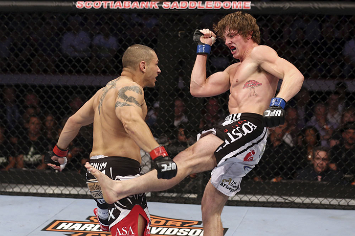 CALGARY, CANADA - JULY 21:  (L-R) Chris Clements takes a kick from Matthew Riddle during their welterweight bout at UFC 149 inside the Scotiabank Saddledome on July 21, 2012 in Calgary, Alberta, Canada.  (Photo by Nick Laham/Zuffa LLC/Zuffa LLC via Getty 