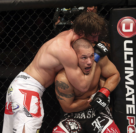 CALGARY, CANADA - JULY 21: (R-L) Chris Clements is caught in a choke hold from Matthew Riddle during their welterweight bout at UFC 149 inside the Scotiabank Saddledome on July 21, 2012 in Calgary, Alberta, Canada. (Photo by Nick Laham/Zuffa LLC/Zuffa LL