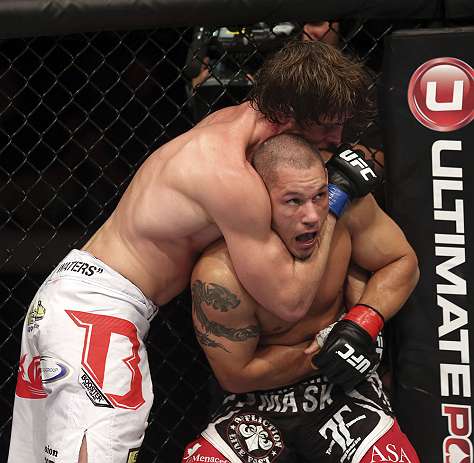 CALGARY, CANADA - JULY 21: (R-L) Chris Clements is caught in a choke hold from Matthew Riddle during their welterweight bout at UFC 149 inside the Scotiabank Saddledome on July 21, 2012 in Calgary, Alberta, Canada.  (Photo by Nick Laham/Zuffa LLC/Zuffa LL