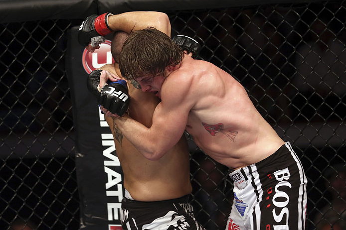 CALGARY, CANADA - JULY 21: (L-R) Chris Clements is caught by Matthew Riddle during their welterweight bout at UFC 149 inside the Scotiabank Saddledome on July 21, 2012 in Calgary, Alberta, Canada. (Photo by Nick Laham/Zuffa LLC/Zuffa LLC via Getty Images