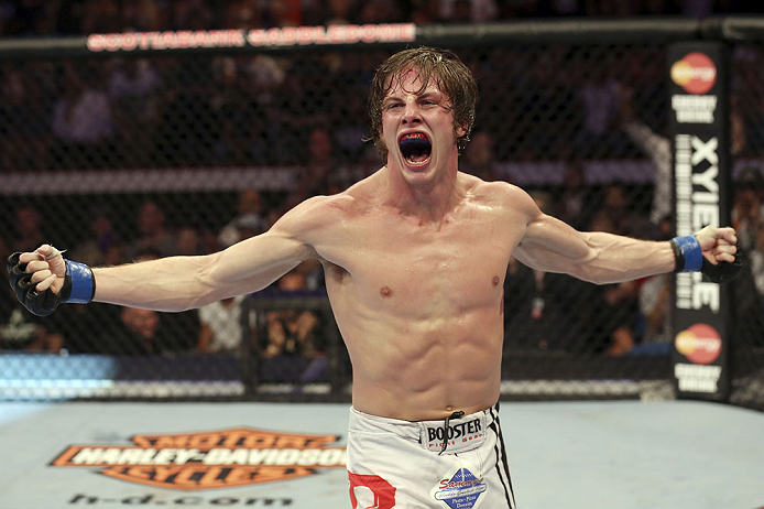 CALGARY, CANADA- JULY 21: Matthew Riddle celebrates after defeating Chris Clements during their welterweight bout at UFC 149 inside the Scotiabank Saddledome on July 21, 2012 in Calgary, Alberta, Canada.  (Photo by Nick Laham/Zuffa LLC/Zuffa LLC via Getty