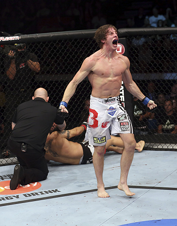 CALGARY, CANADA- JULY 21: Matthew Riddle celebrates after defeating Chris Clements during their welterweight bout at UFC 149 inside the Scotiabank Saddledome on July 21, 2012 in Calgary, Alberta, Canada.  (Photo by Nick Laham/Zuffa LLC/Zuffa LLC via Getty