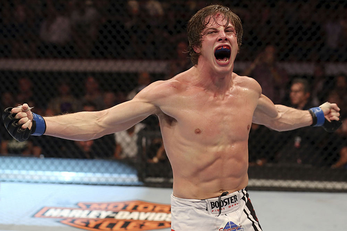 CALGARY, CANADA- JULY 21: Matthew Riddle celebrates after defeating Chris Clements during their welterweight bout at UFC 149 inside the Scotiabank Saddledome on July 21, 2012 in Calgary, Alberta, Canada.  (Photo by Nick Laham/Zuffa LLC/Zuffa LLC via Getty