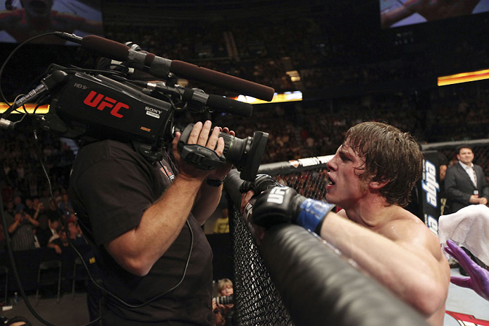 CALGARY, CANADA- JULY 21: Matthew Riddle celebrates after defeating Chris Clements during their welterweight bout at UFC 149 inside the Scotiabank Saddledome on July 21, 2012 in Calgary, Alberta, Canada.  (Photo by Nick Laham/Zuffa LLC/Zuffa LLC via Getty