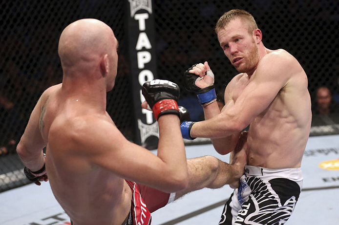 CALGARY, CANADA - JULY 21: (L-R) Brian Ebersole lands a kick at the body of James Head during their welterweight bout at UFC 149 inside the Scotiabank Saddledome on July 21, 2012 in Calgary, Alberta, Canada. (Photo by Nick Laham/Zuffa LLC/Zuffa LLC via G