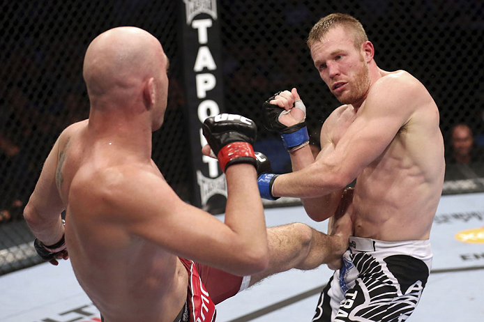 CALGARY, CANADA - JULY 21: (L-R) Brian Ebersole lands a kick at the body of James Head during their welterweight bout at UFC 149 inside the Scotiabank Saddledome on July 21, 2012 in Calgary, Alberta, Canada.  (Photo by Nick Laham/Zuffa LLC/Zuffa LLC via G