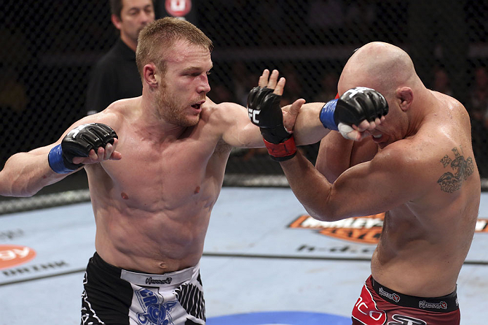 CALGARY, CANADA - JULY 21: (L-R) James Head throws a punch at Brian Ebersole during their welterweight bout at UFC 149 inside the Scotiabank Saddledome on July 21, 2012 in Calgary, Alberta, Canada. (Photo by Nick Laham/Zuffa LLC/Zuffa LLC via Getty Image